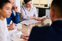 Work group of people performing reserve study